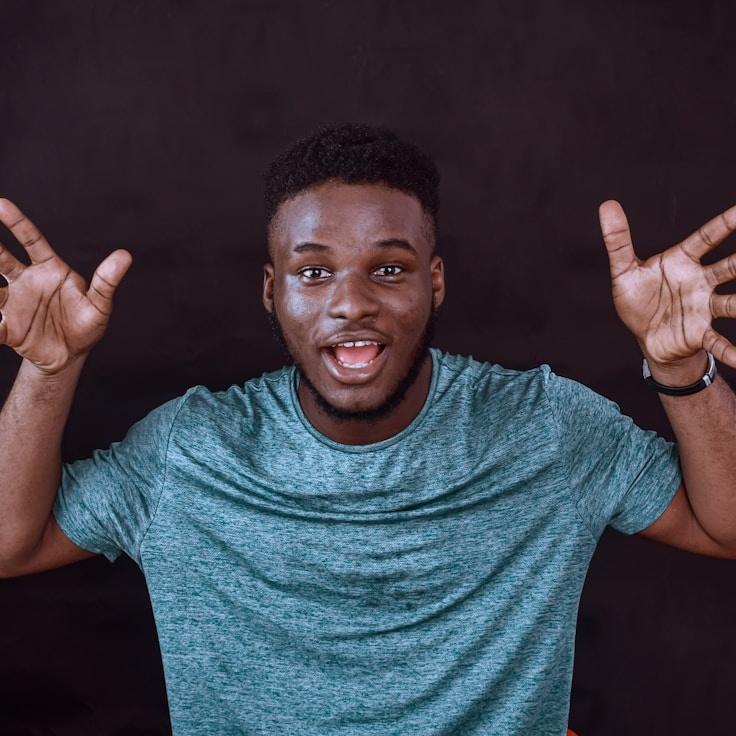 Asha Nair, Lead Design Curator at Meadow Sage Plume, reviewing corporate floral arrangements